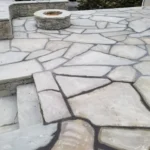 Flagstone patio and natural stone fire pit