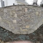 Natural stone retaining wall
