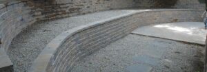 Manufactured stone tiered walls