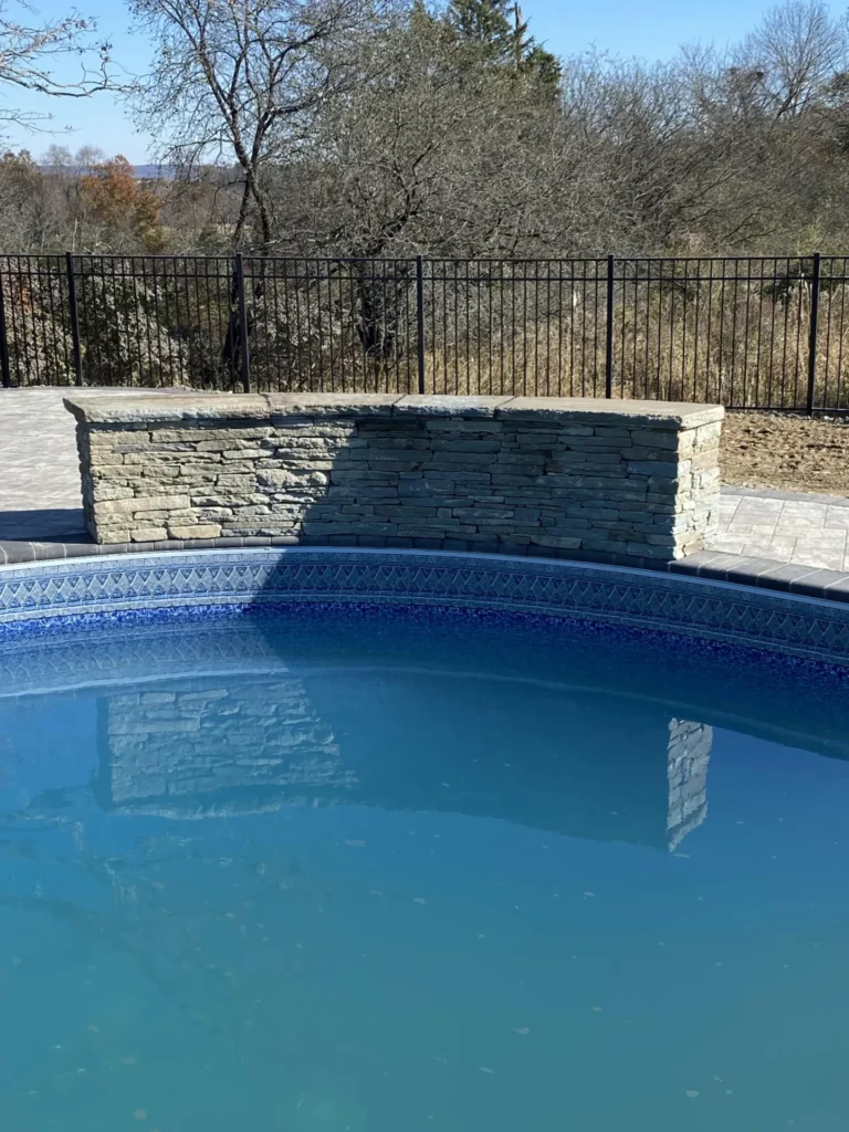 Natural stone pool water feature