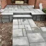 Geometric bluestone walkway, steps and patio