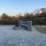 Manufactured stone fire pit and patio