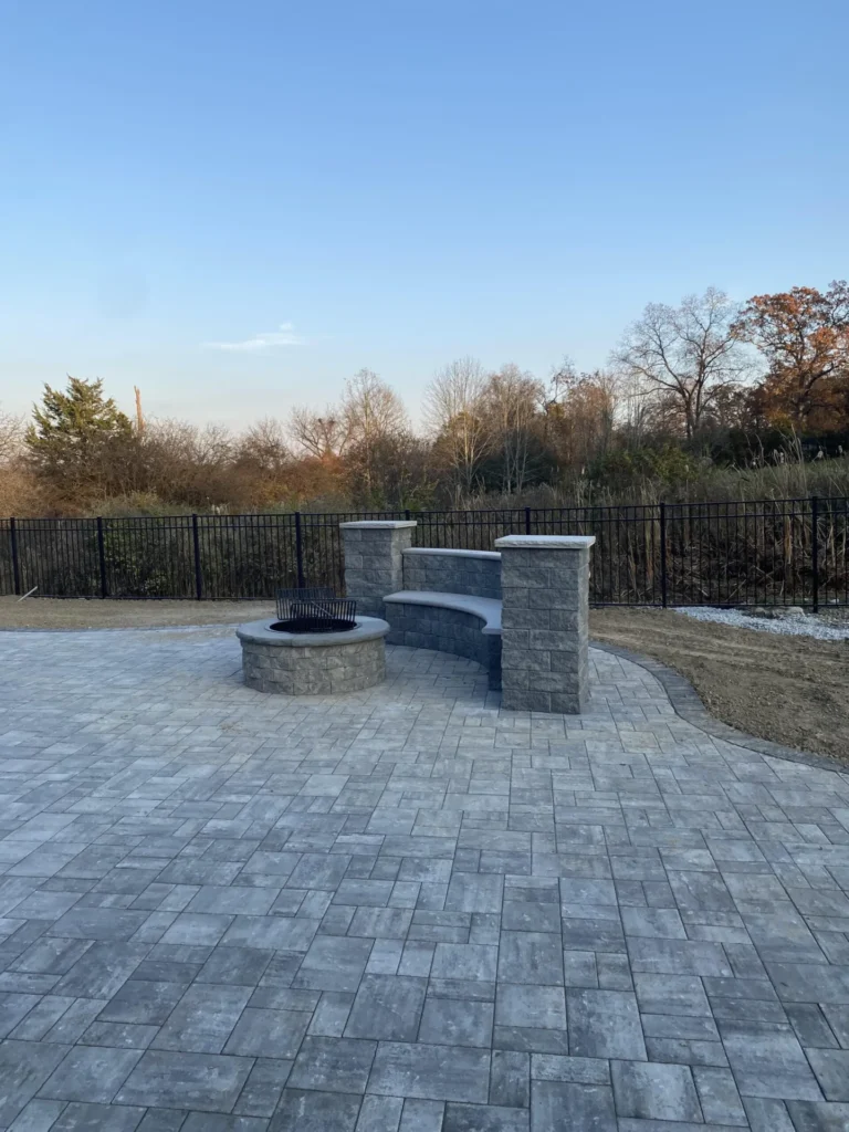 Manufactured stone fire pit and patio