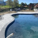 Manufactured stone pool surround