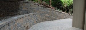 Manufactured stone tiered walls
