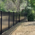 Black vinyl and aluminum fences