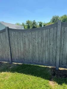 Scalloped wood privacy fence