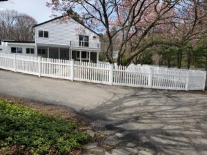 White vinyl picket fence