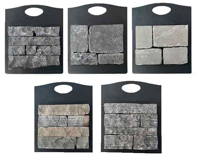 Five stone veneer sample boards displaying various colors, shapes, and textures to compare styles for exterior siding or accent wall applications.